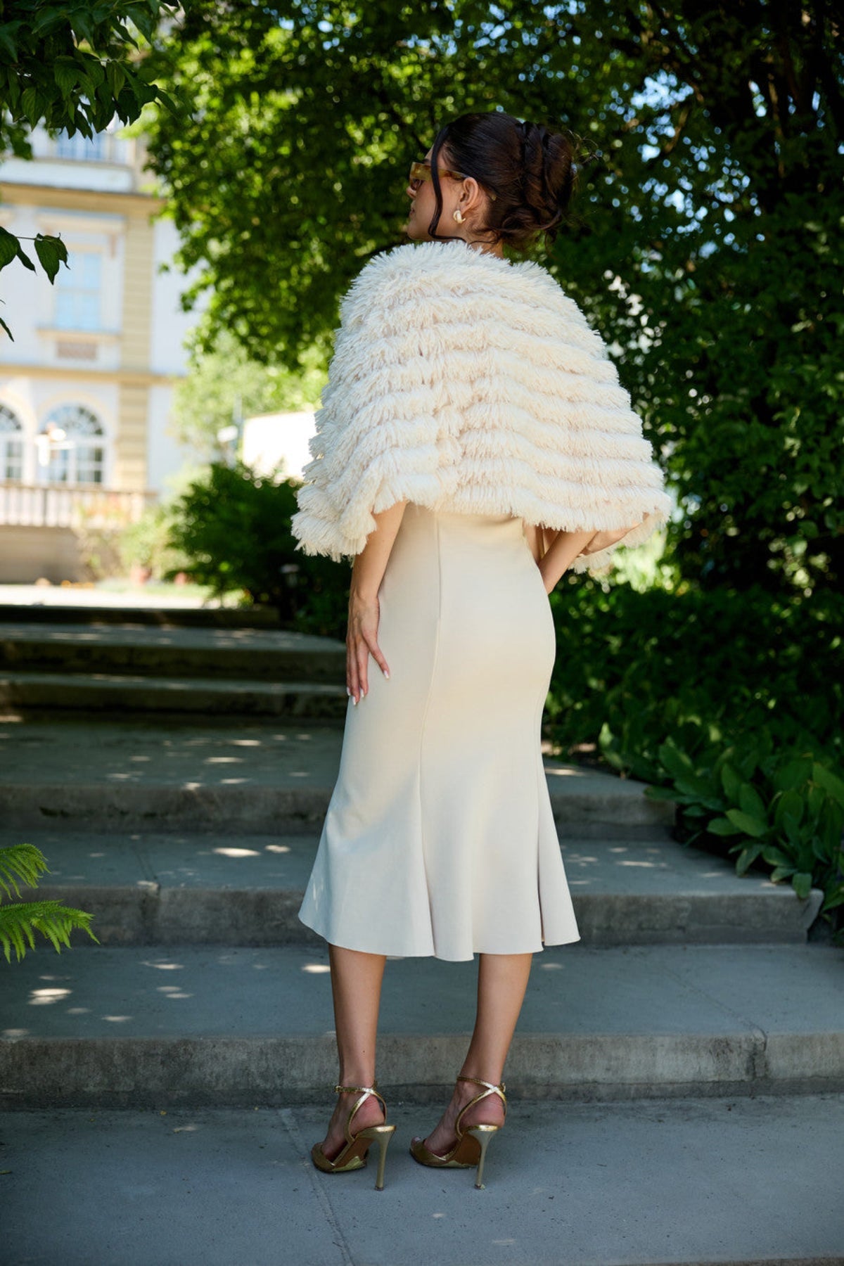Saachi Faux Fur Tasseled Capelet